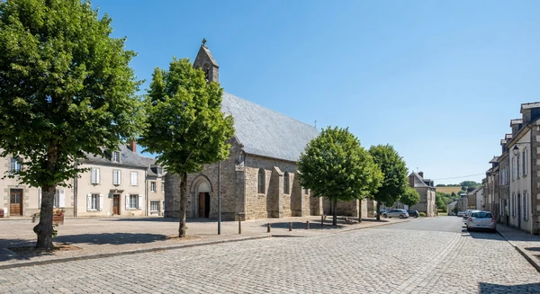 Photographie réelle de la commune de Couzeix près de Limoges, montrant un élément caractéristique de la localité (une rue typique, une place, un bâtiment remarquable ou un carrefour important) en bon état de jour. L'image doit clairement identifier Couzeix comme un lieu distinct et professionnellement établi, sans personnages en avant-plan, permettant d'illustrer l'une des zones de couverture géographique du garage automobile.